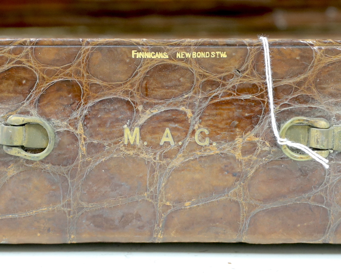 A Finnigans crocodile leather attaché case, pre 1940, with interior figments and blotter, 45cm wide, 28cm deep